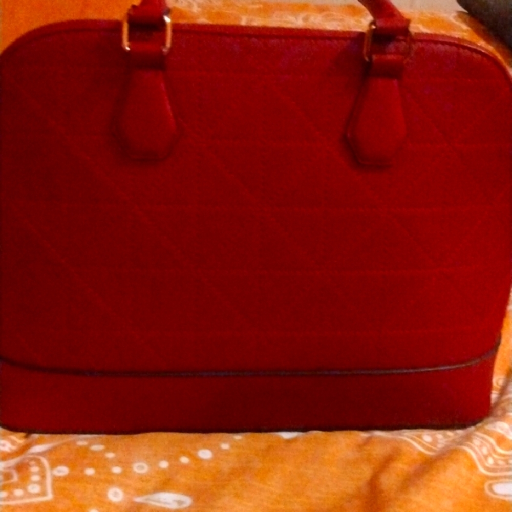 Red purse brand name